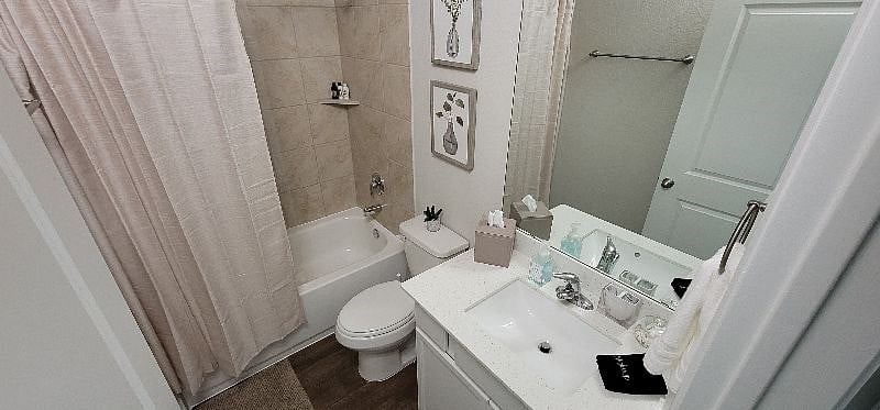 Downstairs bathroom adjacent to downstairs bedroom.