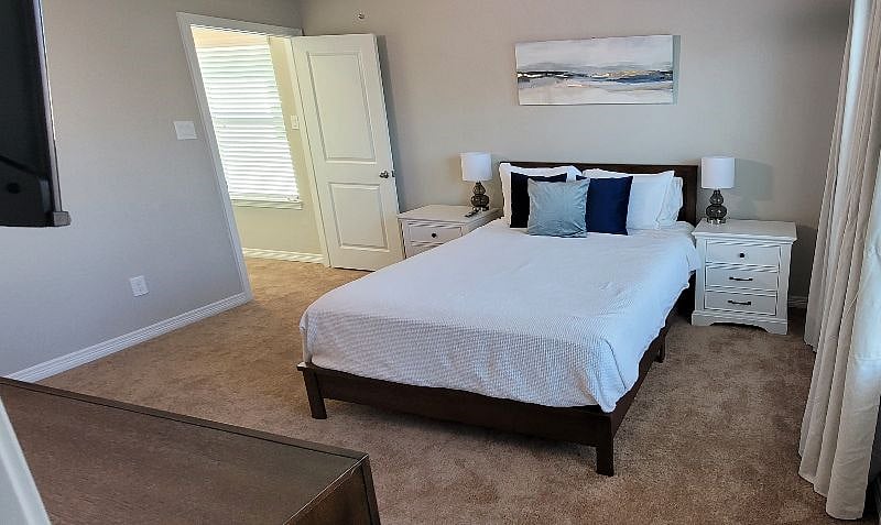 Upstairs secondary bedroom.