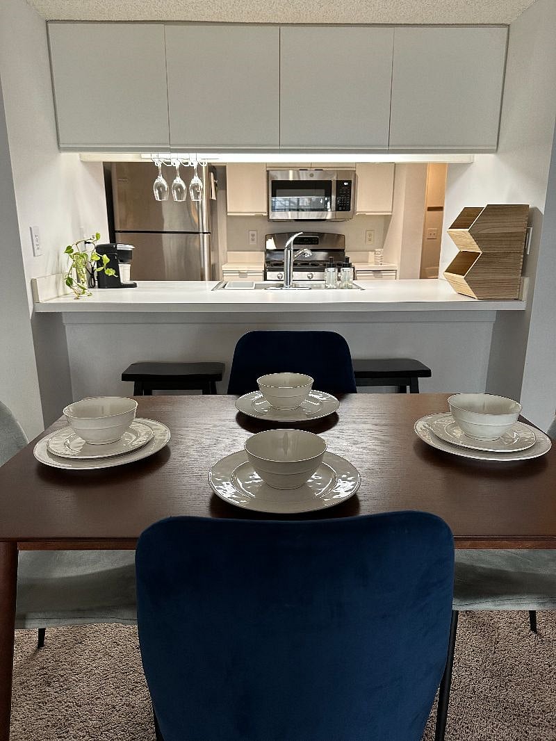 Dining table that seats 4 and 2 counter stools.
