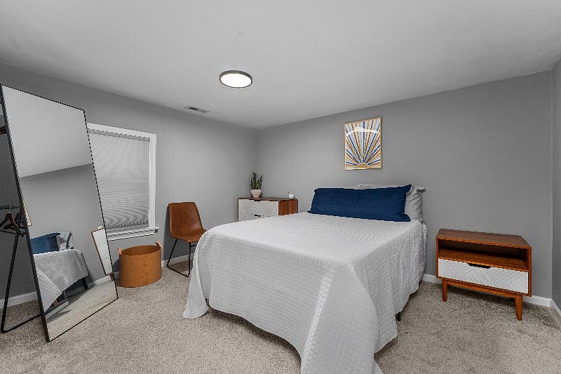 Bedroom 2 upstairs with a Full Bed. All upstairs bedrooms are equipped with additional high-quality storage bins under the beds.