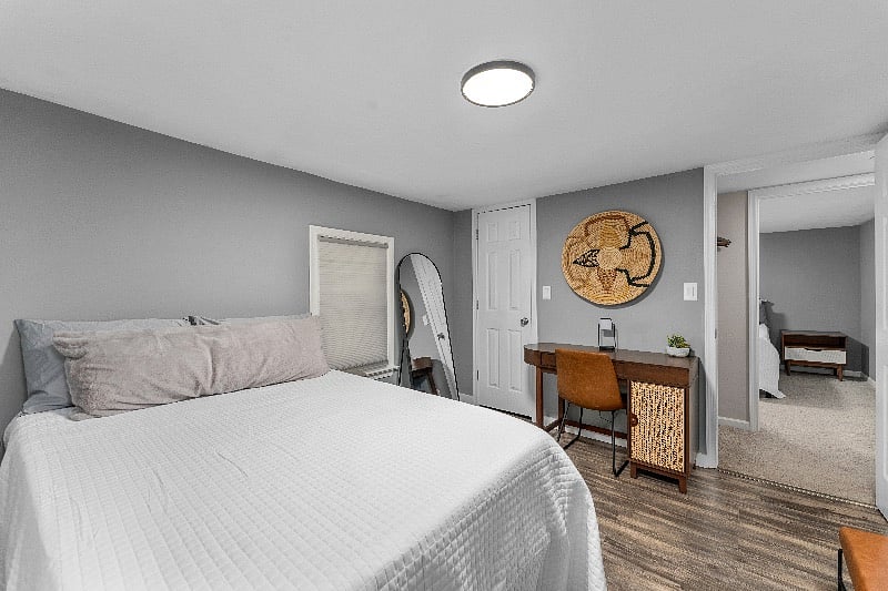 Bedroom 3 upstairs with a Full Bed and work desk. All upstairs bedrooms are equipped with additional high-quality storage bins under the beds.