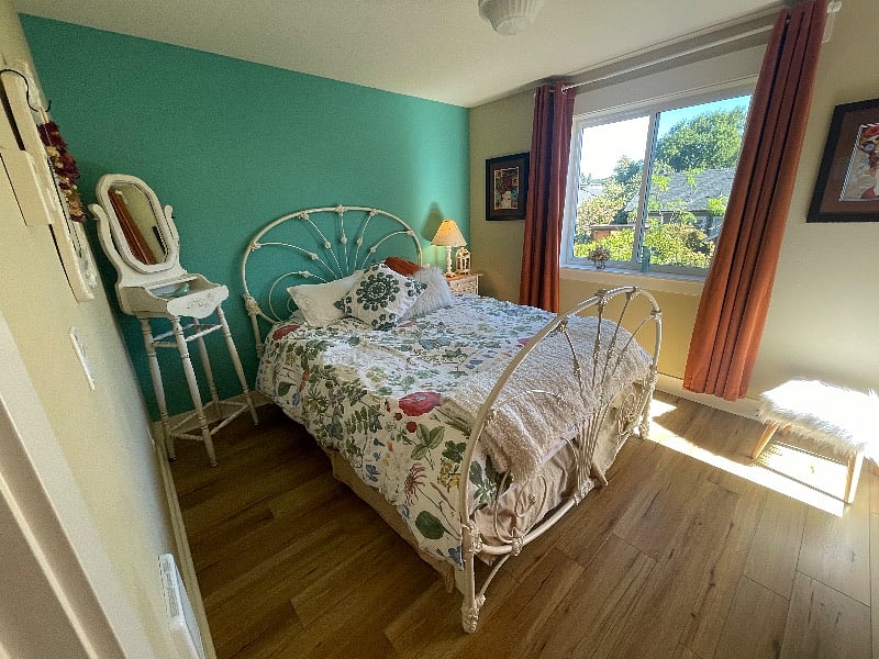 Upstairs loft bedroom with garden view and sweet small balcony