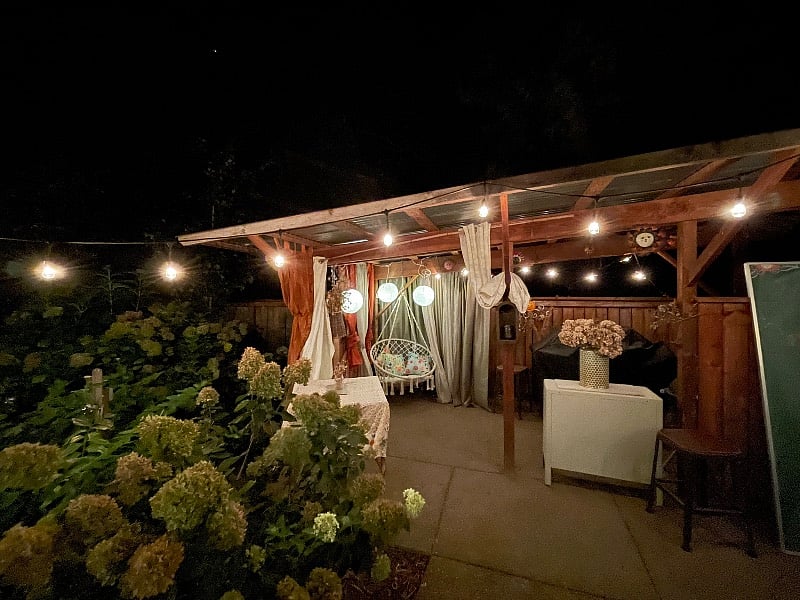 Outdoor kitchen area lit up at night