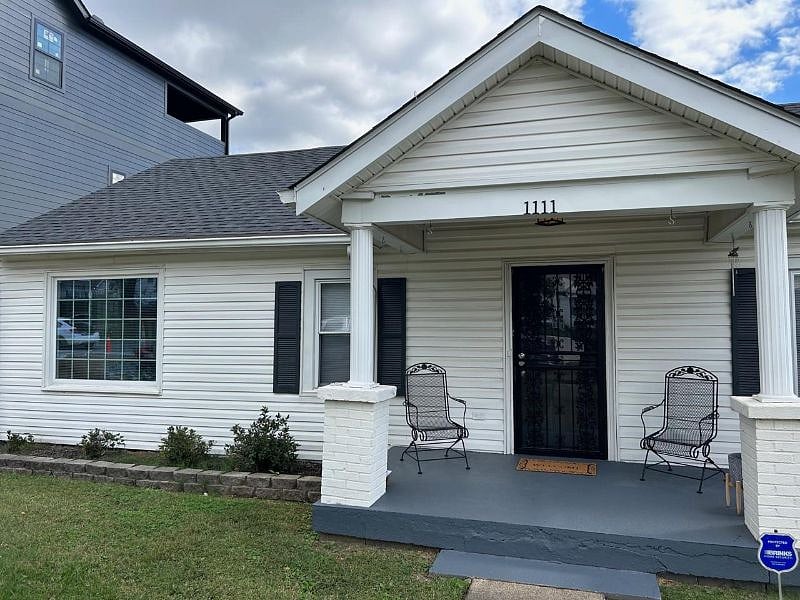 Seating for two on the front porch. Enjoy the quiet neighborhood, drink coffee in the morning.