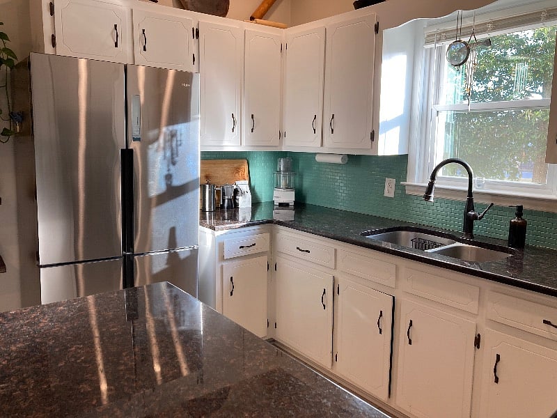 New stainless Haier fridge with quad French Doors