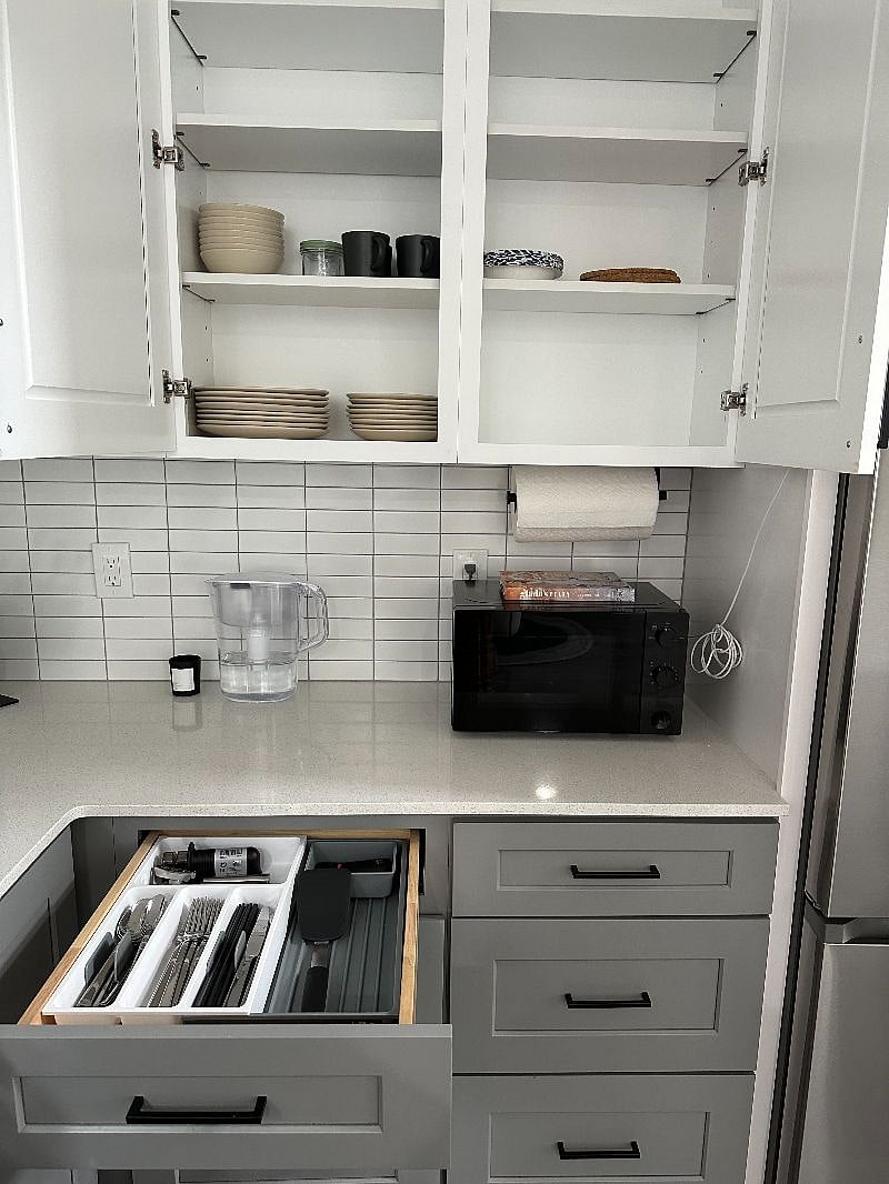 Dishware, microwave, Mayer's pots and pen. Coffee maker and blender upon request.