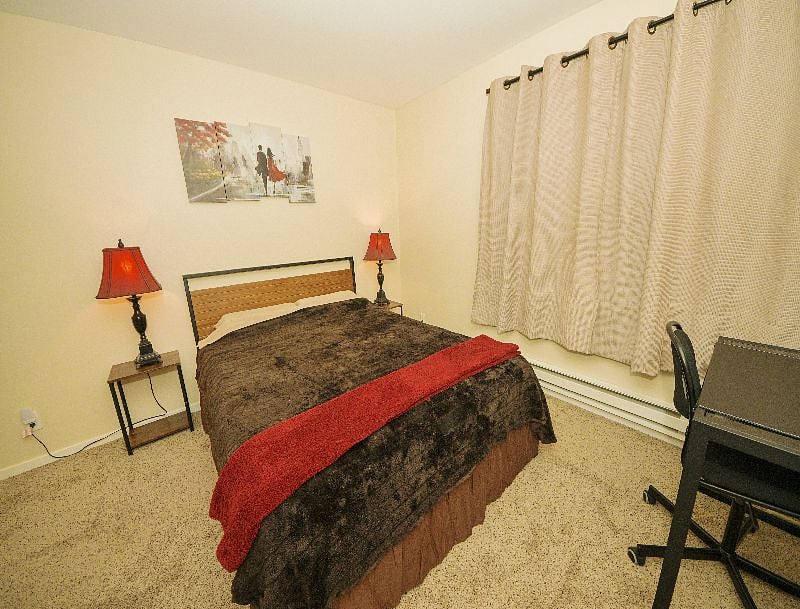 Master bedroom with walk- in closet