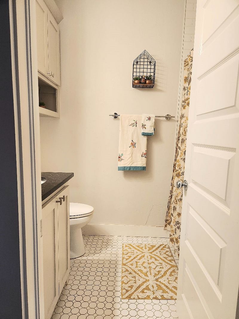 Bathroom for Room A and B. Shower/tub combo.