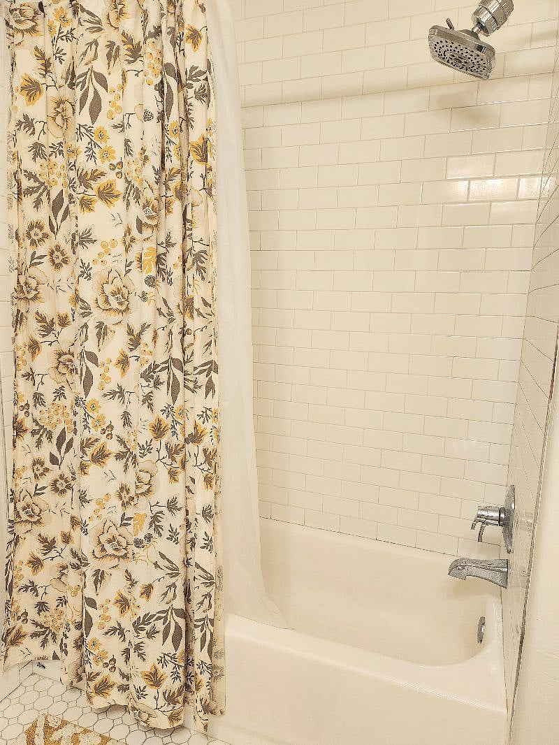 Bathroom for Room A and B. Shower/tub combo.