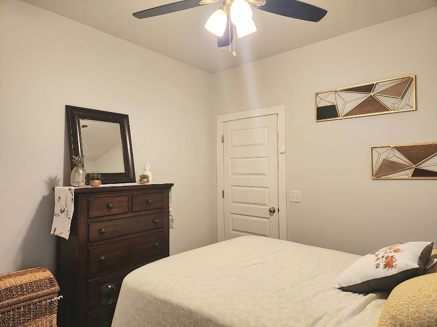 Room B - Queen Bed with dresser, mirror and spacious closet. 