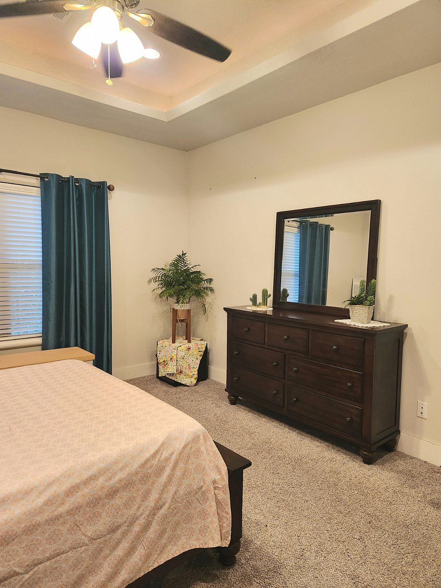 Room C - Queen Bed with dresser, mirror and spacious closet. 