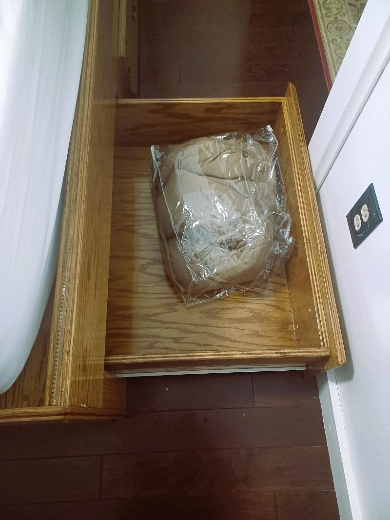 Extra Blankets and sheets stored in bed drawers