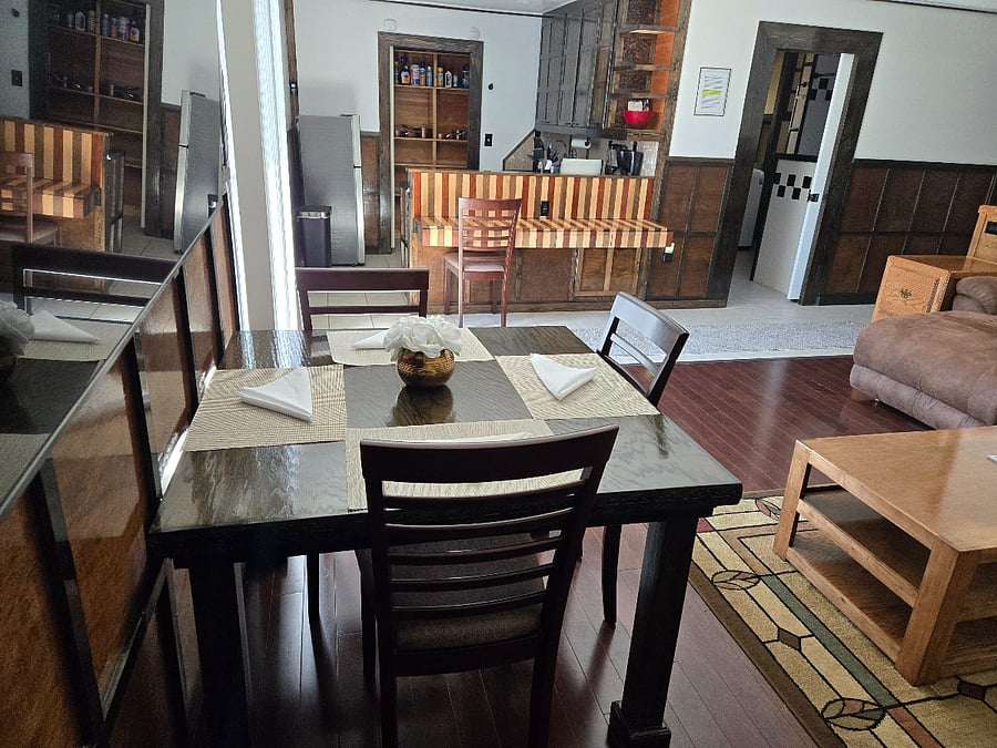 View from living room corner into kitchen and pantry.  Spacious!