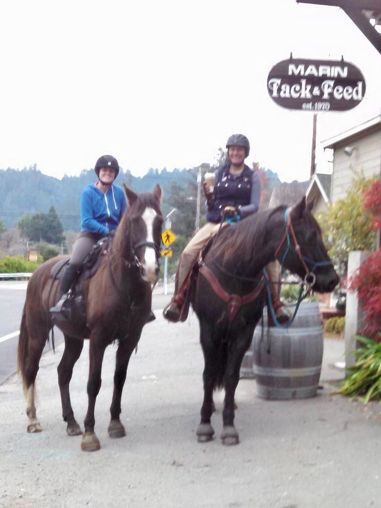Jessica with her horses Billy and Sid and her friend Shonna visiting her store on a day off.