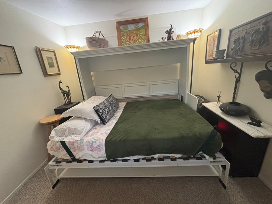 The Safari room with the Murphy bed pulled out for use