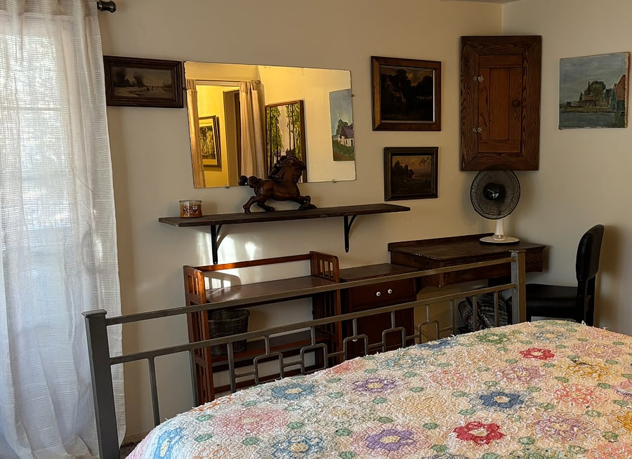 Private writing area within the Countryside Quarters room, one can see the slider that leads to the private deck and back entrance