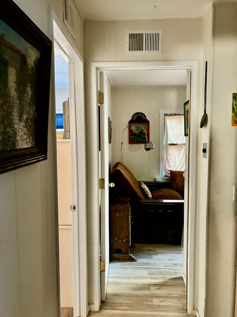 Hallway leading from the Buddy Boudoir room to the Cozy Kitchenette, and the Equestrian Escape bedroom, with in the in-law unit