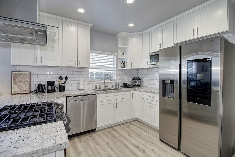 Touch the new fridge screen to show the food inside. It's a big tablet built-in, plus a Samsung smart speaker too! 