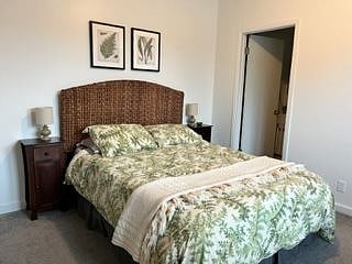 Queen bed with comfy mattress. 2 closets and 2 chest -of-drawers. 2 bed-side tables with cabinet.