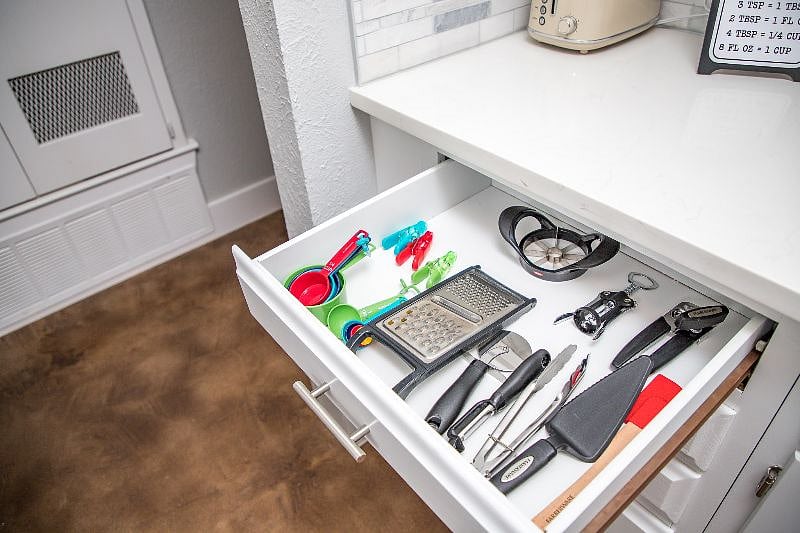 You'll have all of the necessary kitchen gadgets including: toaster, hand mixer, blender, measuring cups/spoons, wine bottle opener, knives, etc.