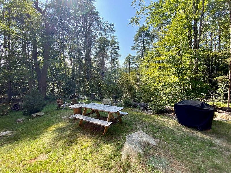 Enjoy the fire pit, picnic table, and grill.