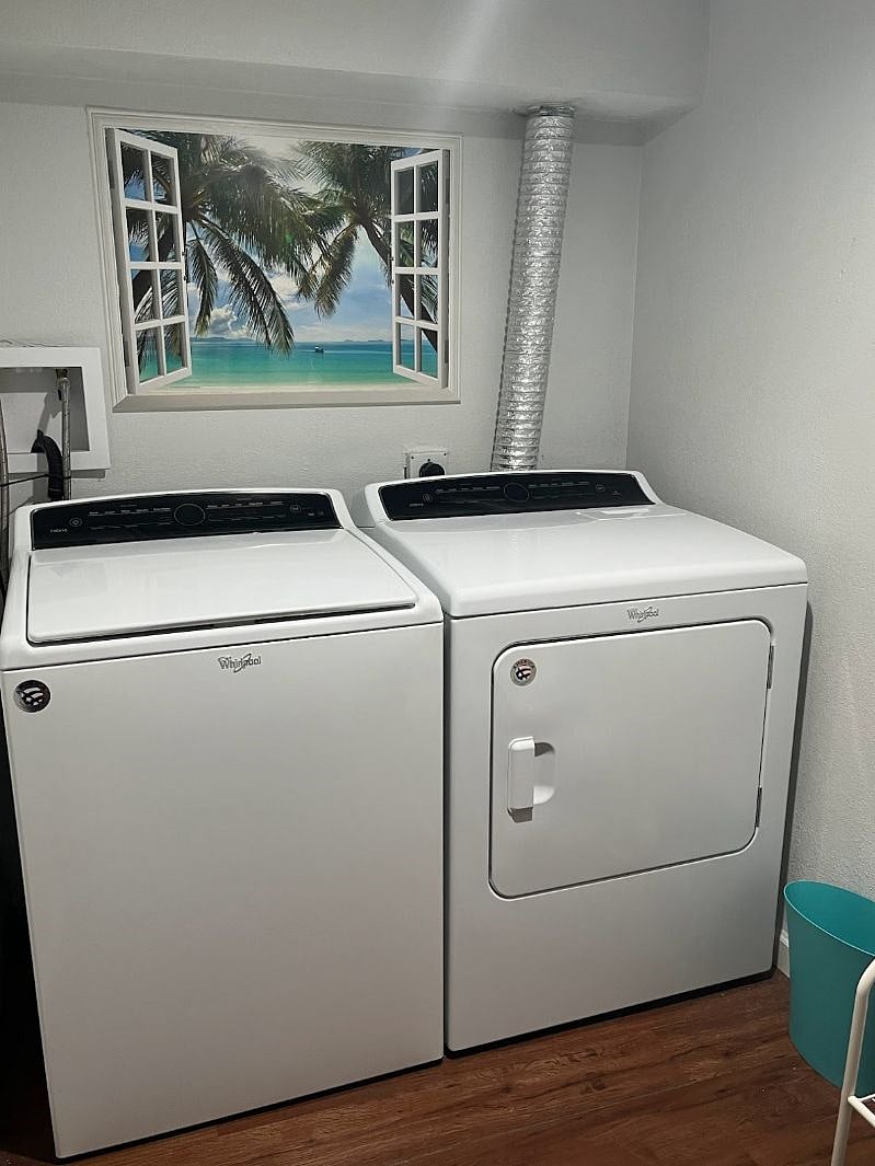 Full size washer and dryer located in basement
