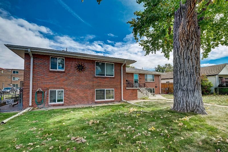 Brick exterior upper apartment in 4plex. Shade tree in front. Fenced back yard, shared with only one other apartment. Sweet dog lives in next apartment with fenced yard of their own. Parking in back, or on street in front.
