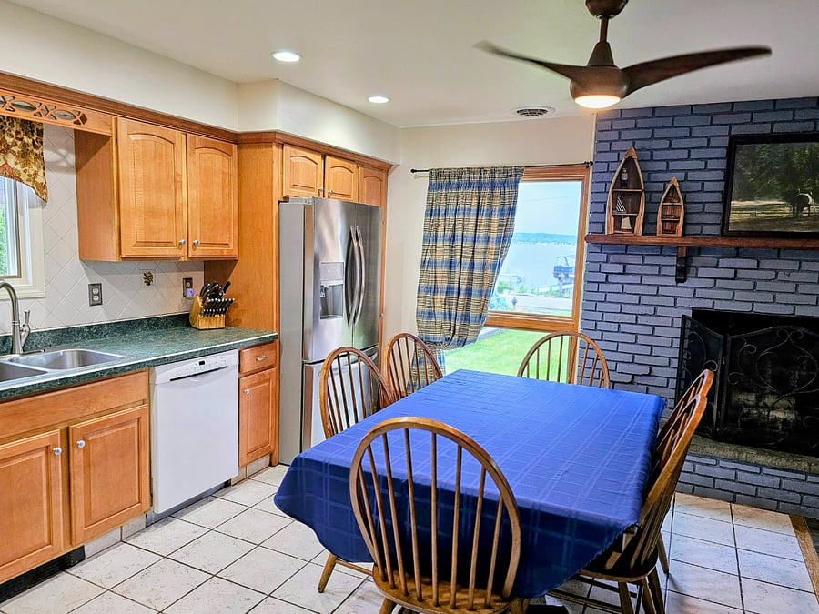 Dining area overlooking Saratoga Lake wildlife and lower Adirondack mountains.