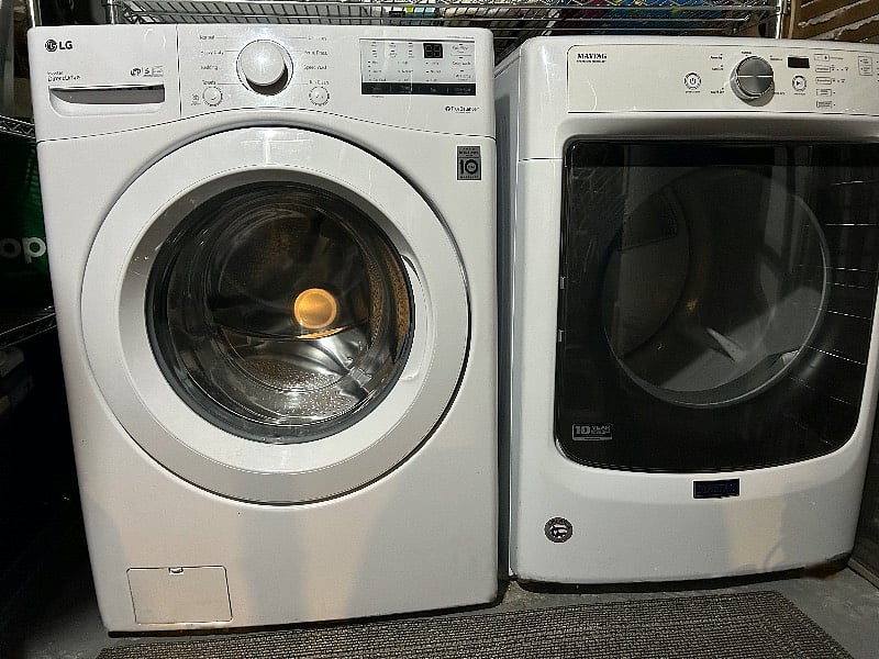 Large-capacity washer and dryer in the basement.