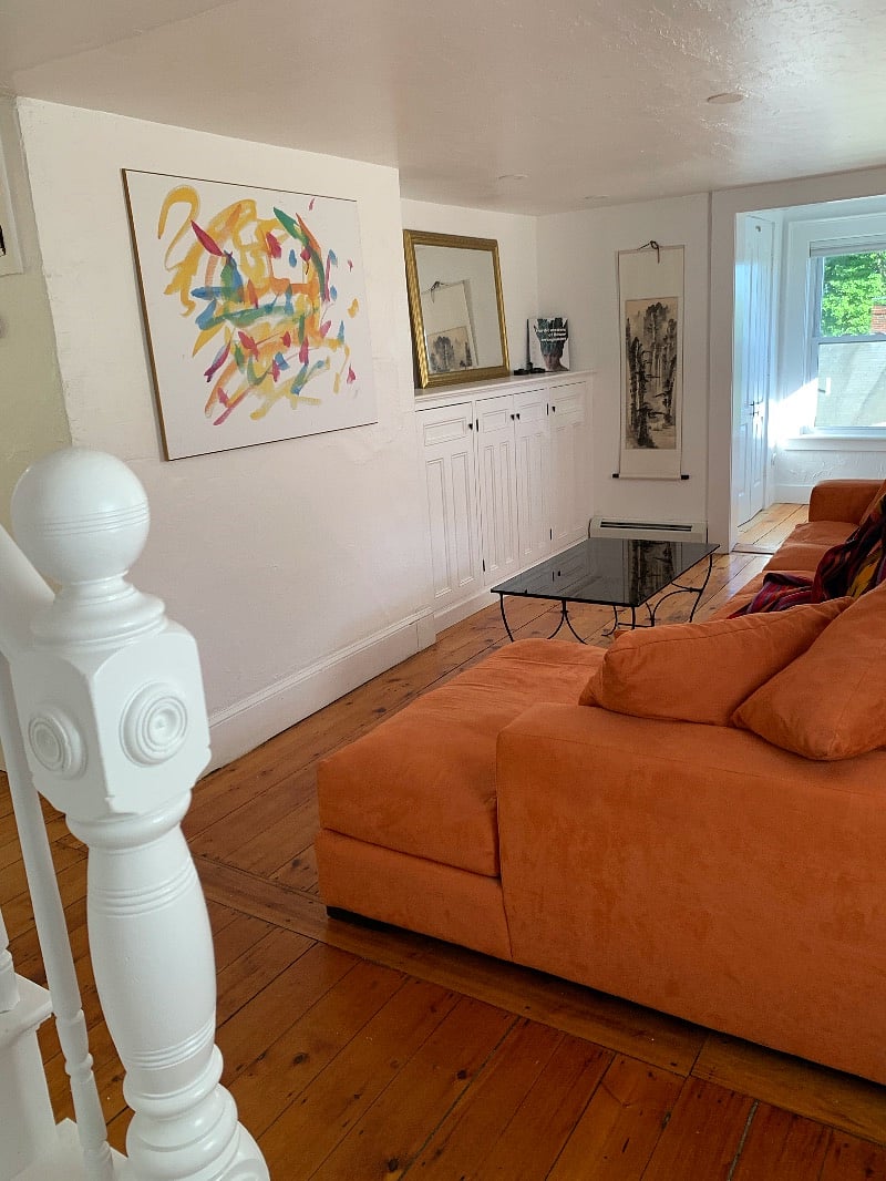View from staircase toward living room and mini-atrium.