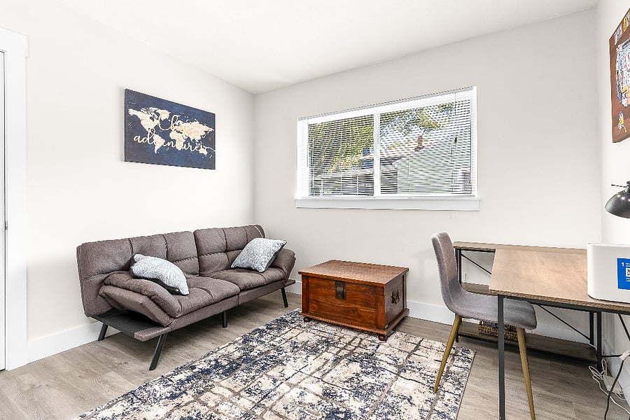 Second bedroom / office with fold flat couch bed.