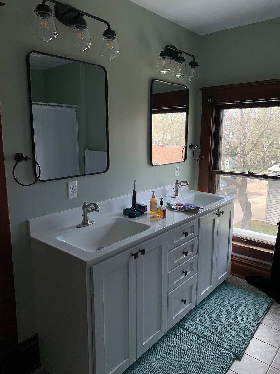 2nd floor bathroom, tub/shower, 2 sinks, large storage closet and toilet. 
