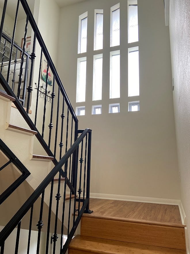 Once through the exterior door, the unit has its own secure entry gate.  There are three half-flights of stairs from the exterior entry door up to the B&B.  The space has a lot of light.