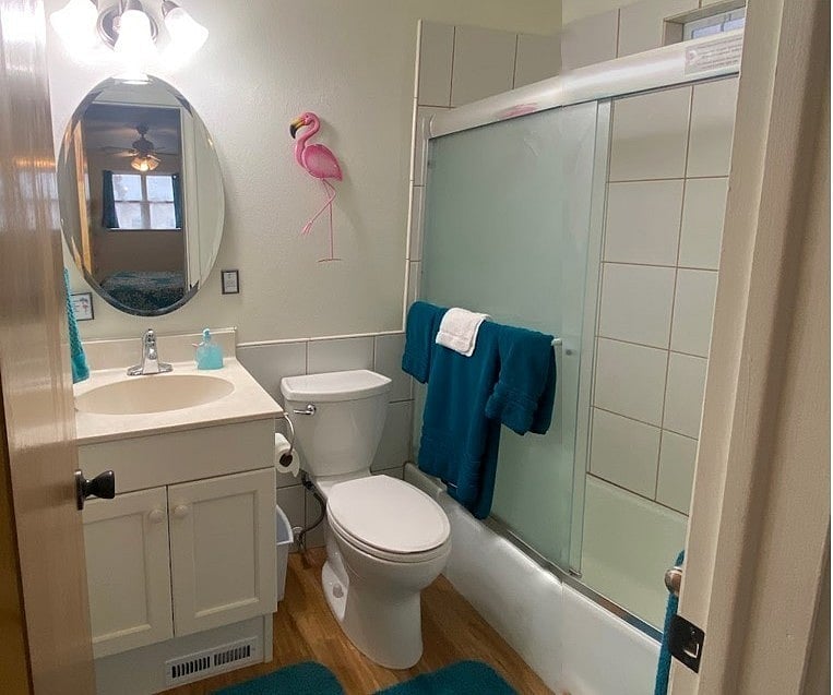 Bedroom 2, attached bath with a tub.