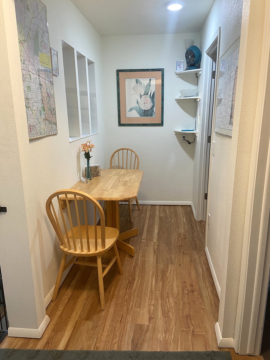 Dining niche.  8.5 x 5.  It's a little cozy, but it works. This is also a great workspace.
