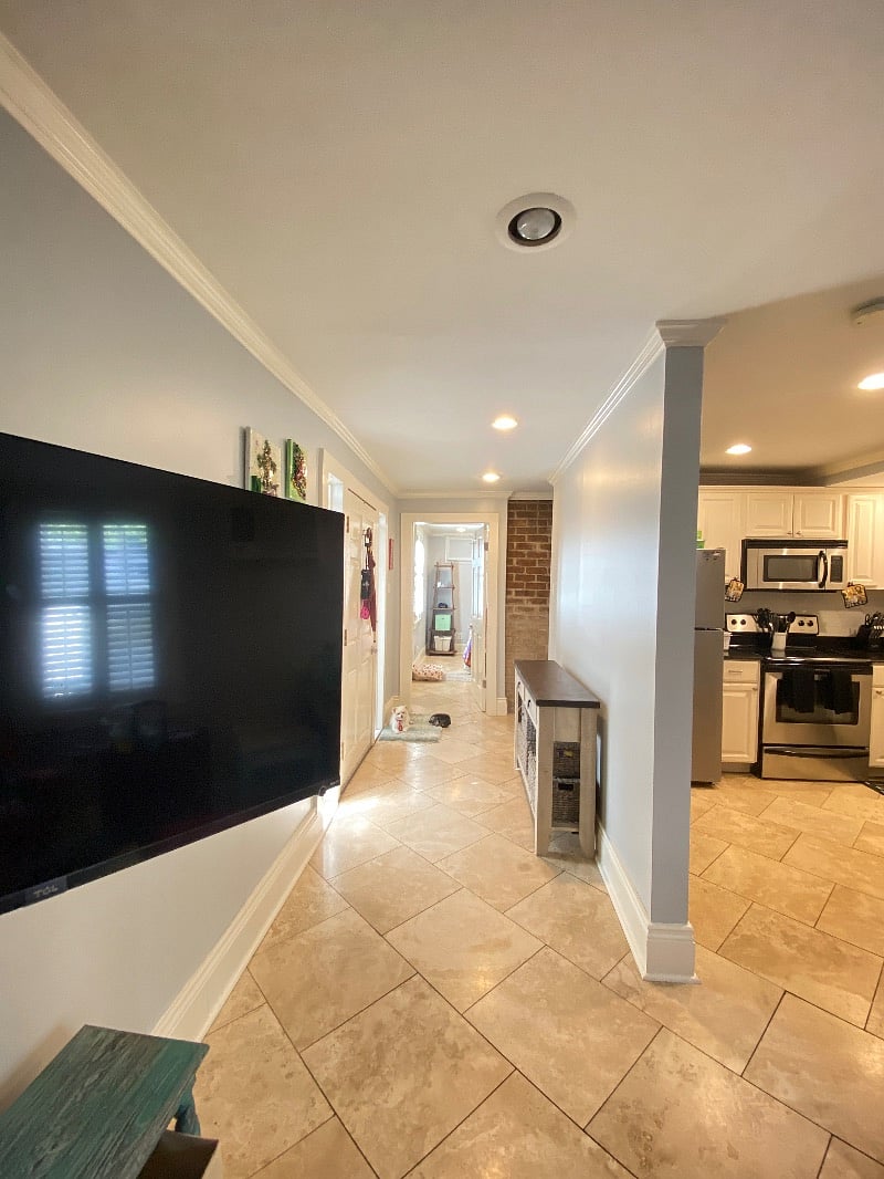 View of Hall to Bedroom, Kitchen, and Smart TV