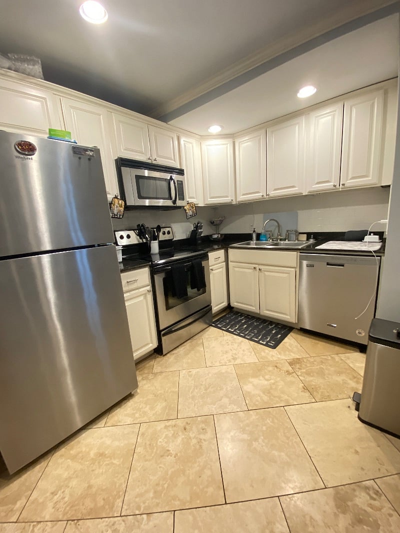 Kitchen with full size Refrig, dishwasher, stove, oven, and microwave