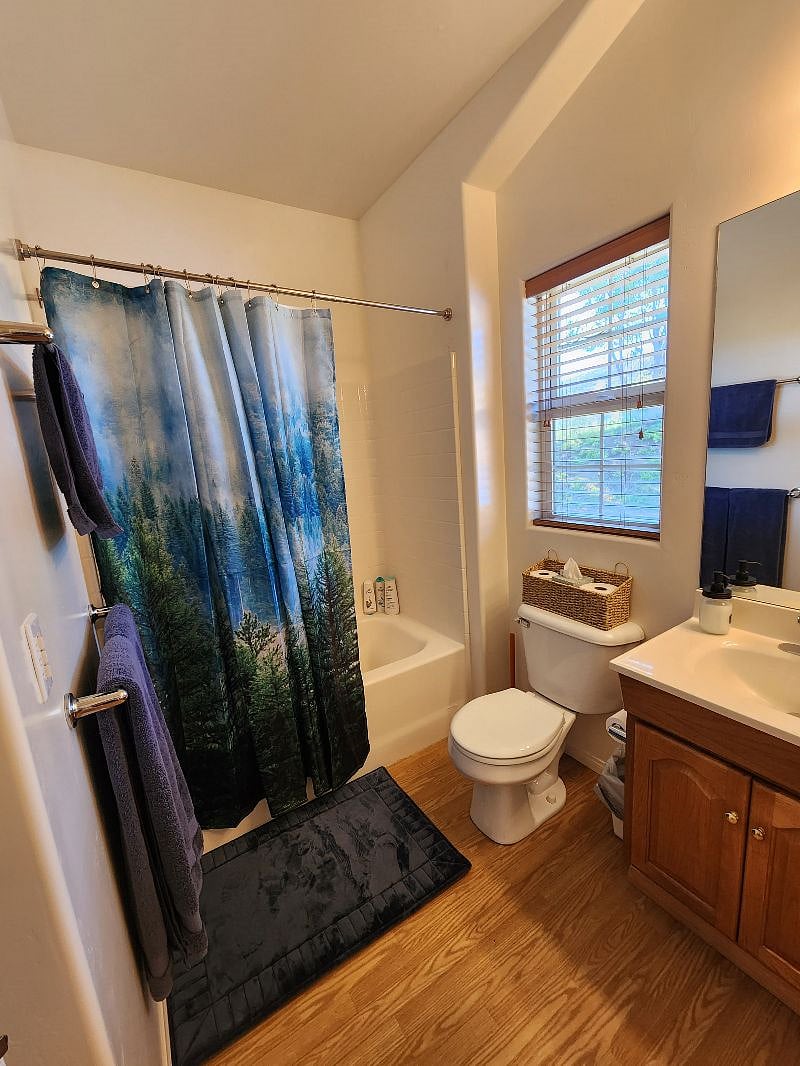 Nice sized bathroom with tub /shower combo. Plenty of storage in the vanity, 3 towel bars for hanging your towel and bathmat.