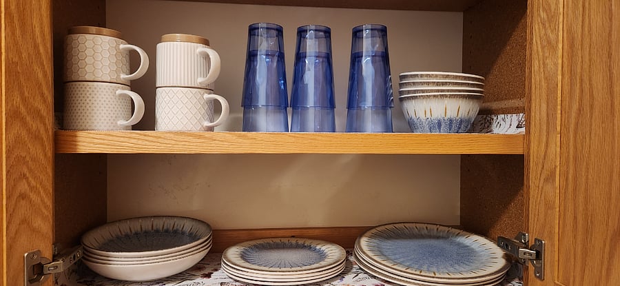 New dishes- 4 coffee cups, 6 plastic tumblers and a melamine dish set.