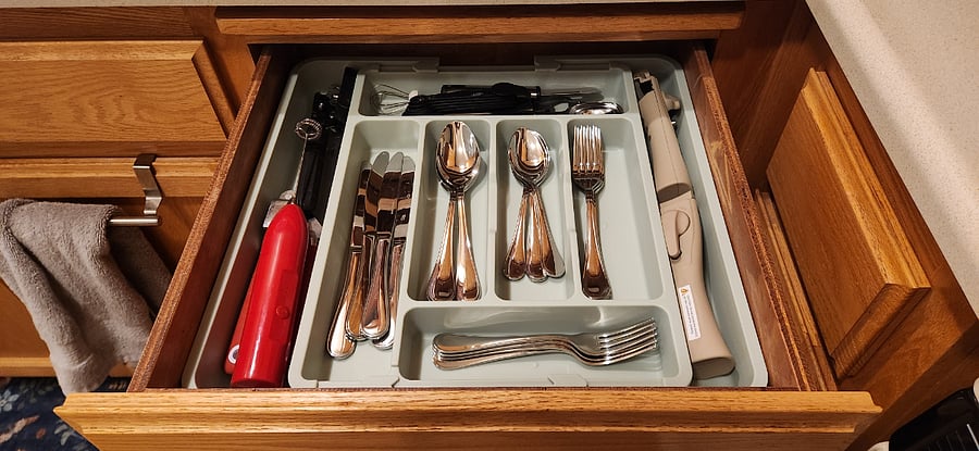Fully stocked utensil drawer