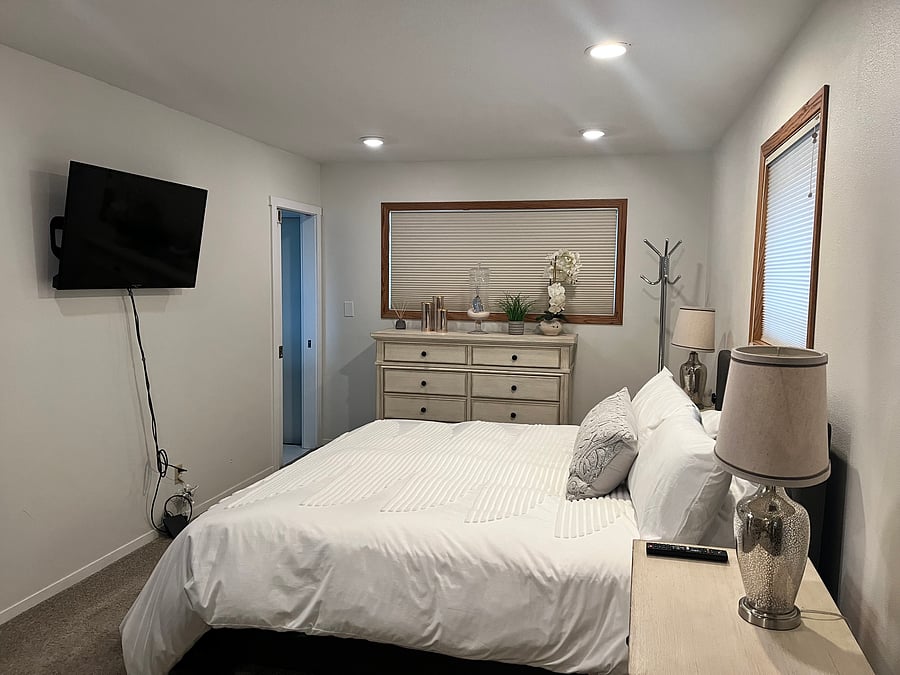 Master bedroom (king bed) with attached bathroom and office space on other side