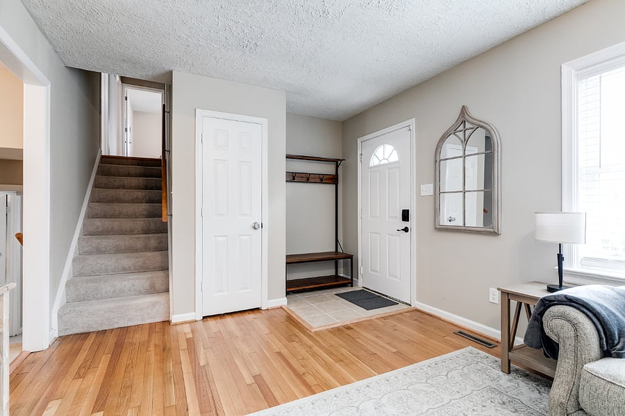 Front entrance with drop zone for coats and shoes.