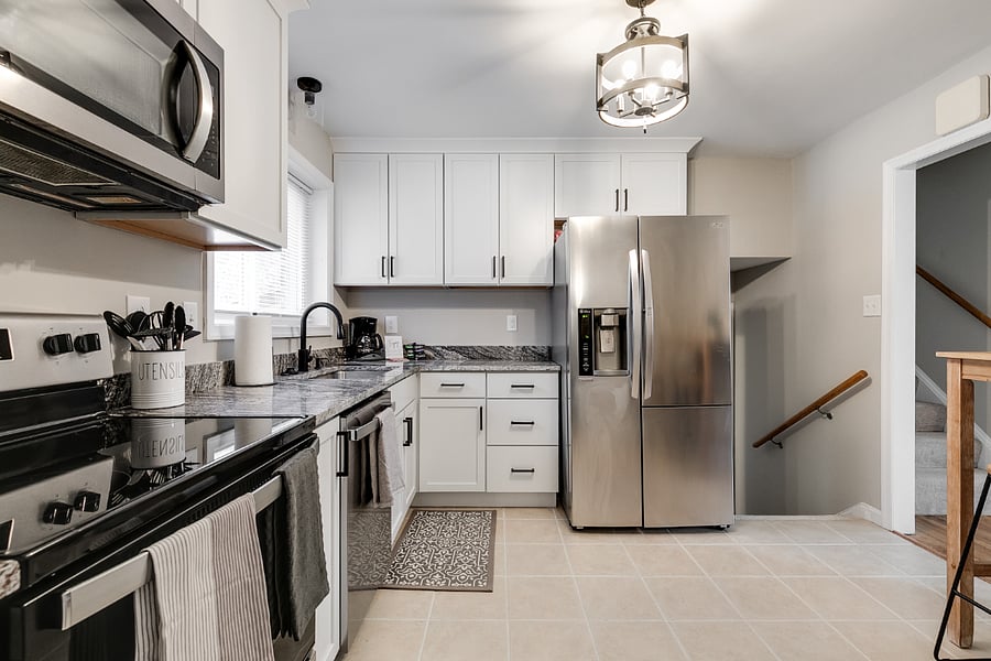 Full kitchen recently remodeled kitchen with new granite countertops, shaker style cabinets and stainless steal appliances. Fully equiped with the essentials for cooking any meal.