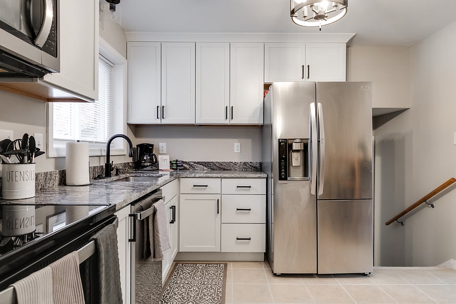 Full kitchen recently remodeled kitchen with new granite countertops, shaker style cabinets and stainless steal appliances. Fully equiped with the essentials for cooking any meal.