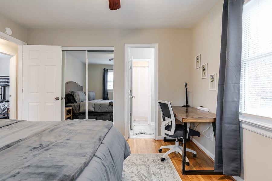 Looking toward private ensuite from primary bedroom.