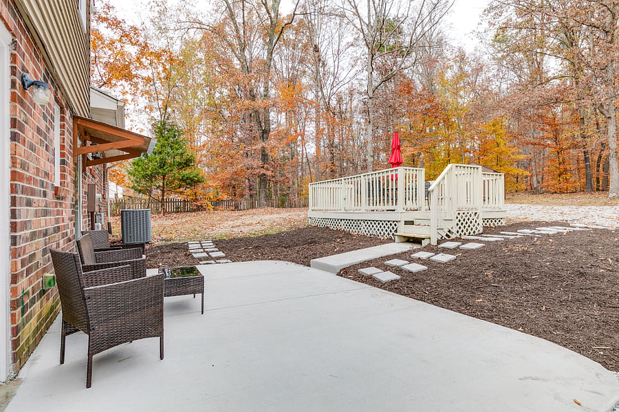 Massive private back yard with large patio, deck and ample parking.