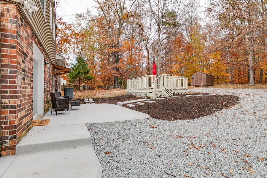 Massive private back yard with large patio, deck and ample parking.