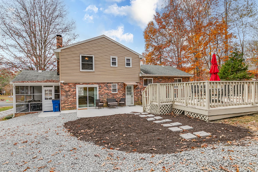 Massive private back yard with large patio, deck and ample parking.