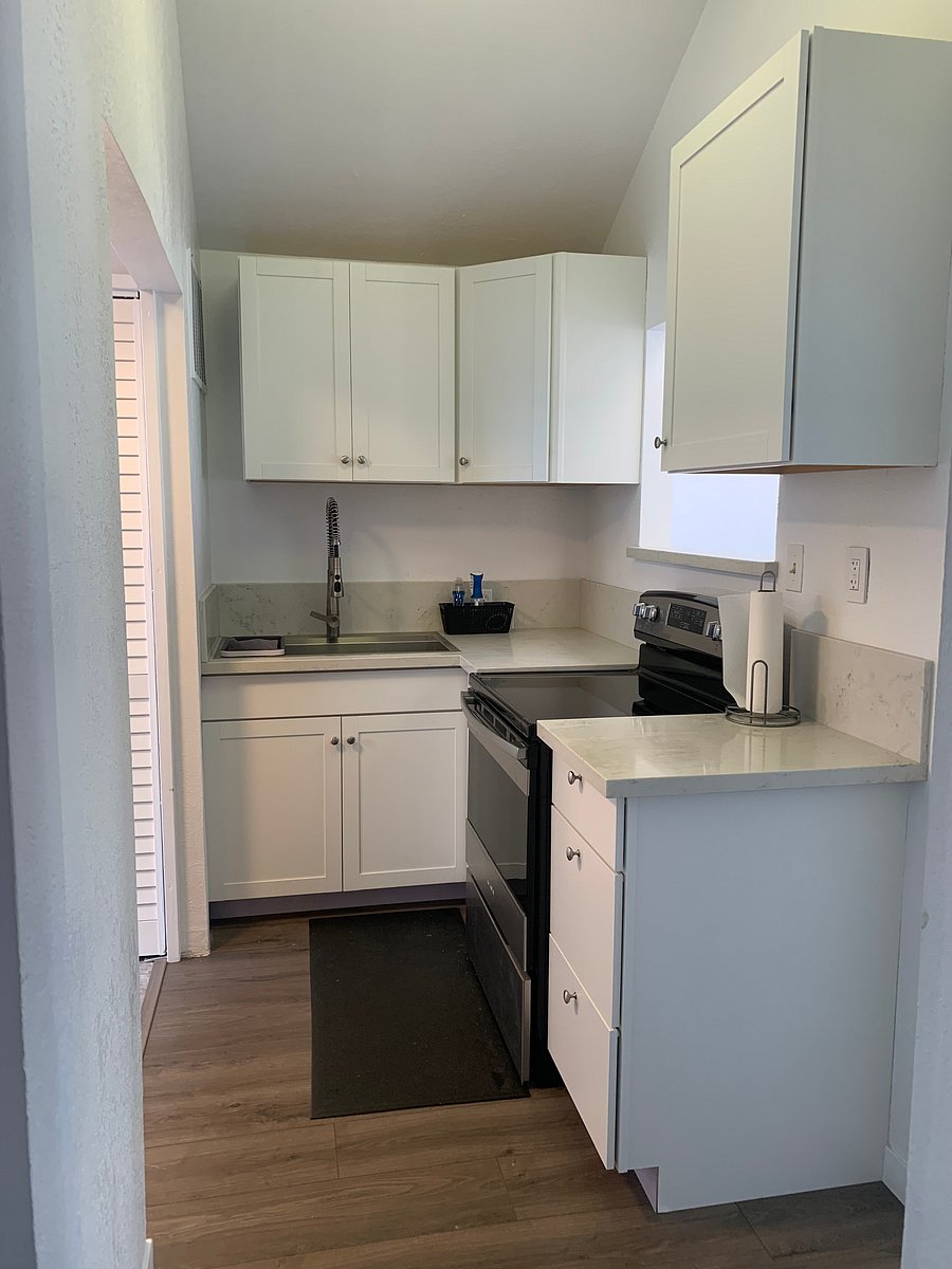 Completely remodeled kitchen. New cabinets, quartz countertops, stainless steel appliances & sink.