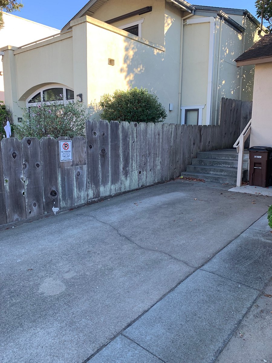 Private driveway adjacent to back door entrance.